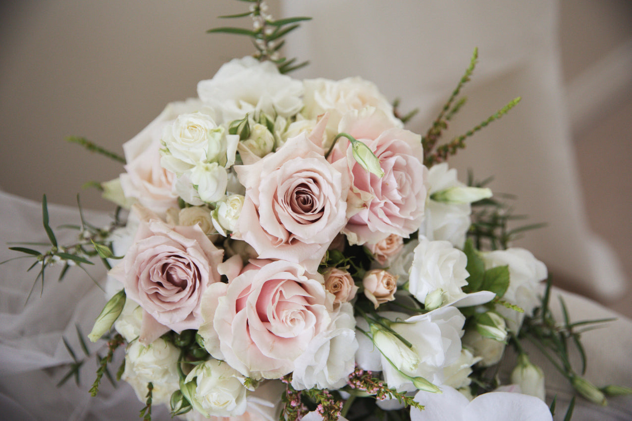 Bridal bouquet with blush and white roses