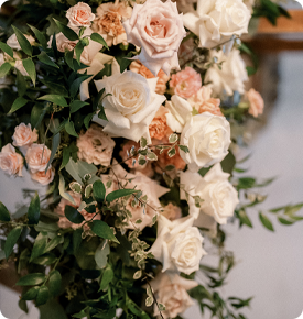 White and pink rose floral arrangement.